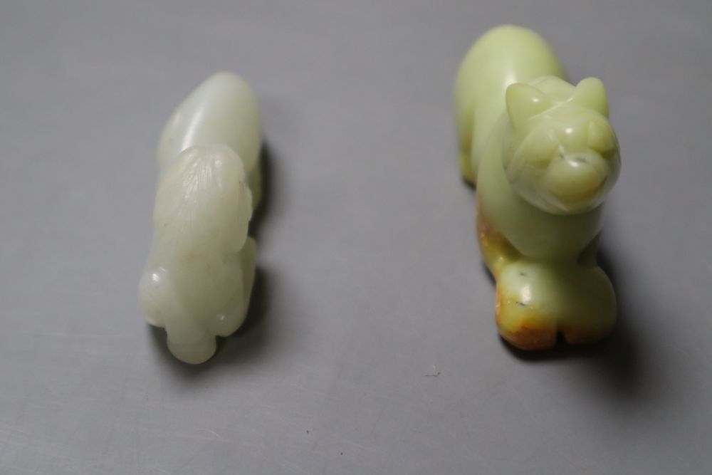 A Chinese pale celadon jade figure of a recumbent horse, 6.4cm and a hardstone figure of a beast,, 7cm